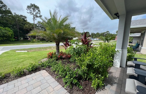 Stuart House | Modern Treasure Coast home with Peloton, EV charger, tennis, patio, & central AC