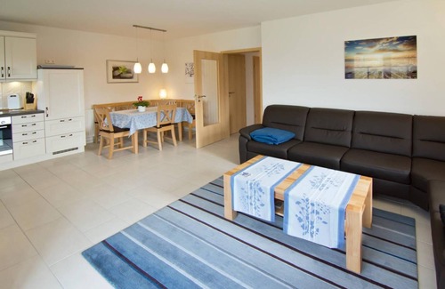 Dornumersiel Apartment | Modern upper apartment Annegret on the canal