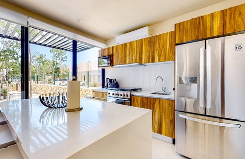 Tulum House | Modern villa with private plunge pool, resort pool, patio, cinema & playground