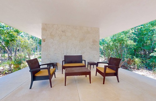 Tulum House | Modern villa with private plunge pool, resort pool, patio, cinema & playground