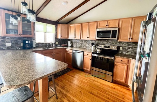 Suttons Bay House | Modern, waterfront beach house in Suttons Bay. Kayaks. Pet friendly.