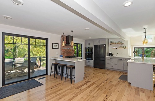 Versailles House | Modern Waterfront Retreat with Hot Tub & Pond Views/Pet-Friendly!