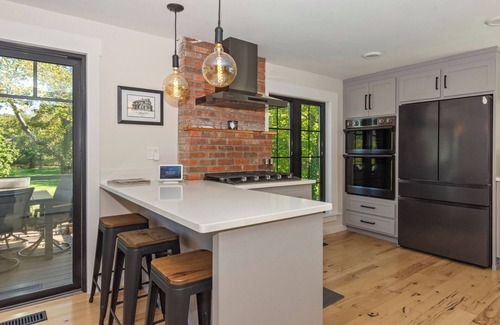 Versailles House | Modern Waterfront Retreat with Hot Tub & Pond Views/Pet-Friendly!