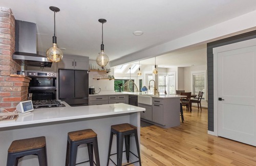 Versailles House | Modern Waterfront Retreat with Hot Tub & Pond Views/Pet-Friendly!