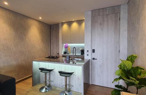 El Laguito Apartment | Moderna suite con balcón y vista al lago y al mar