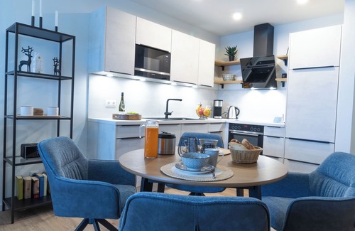 Dorumer Neufeld Apartment | Moderne Ferienwohnung mit Balkon und Sauna in Strandnähe