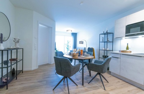 Dorumer Neufeld Apartment | Moderne Ferienwohnung mit Balkon und Sauna in Strandnähe