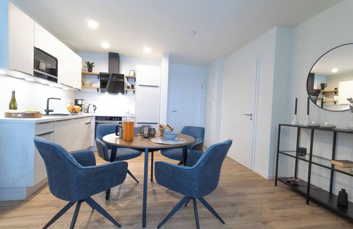 Dorumer Neufeld Apartment | Moderne Ferienwohnung mit Balkon und Sauna in Strandnähe