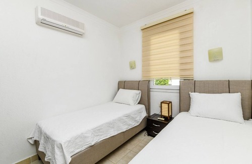Mentese Apartment | Modernly Designed 2BR Villa W/ Communal Pool & Balcony Bodrum Apartment 1005