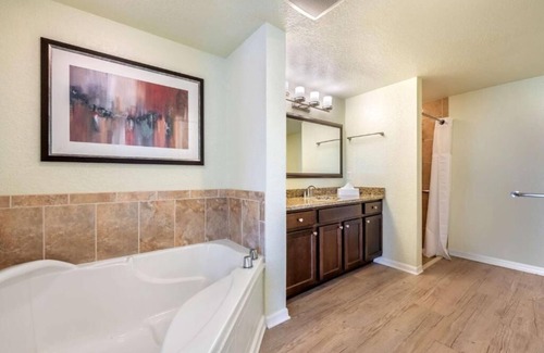 West Kissimmee Hotel | Moments from Theme Parks! Outdoor Pool, Full Kitchen, Free Shuttle!