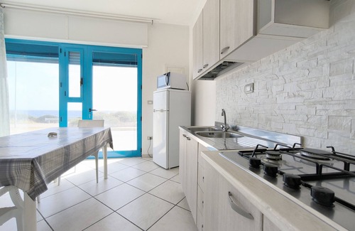 Posto Rosso House | MONOLOCALE LA CORTE SUL MARE