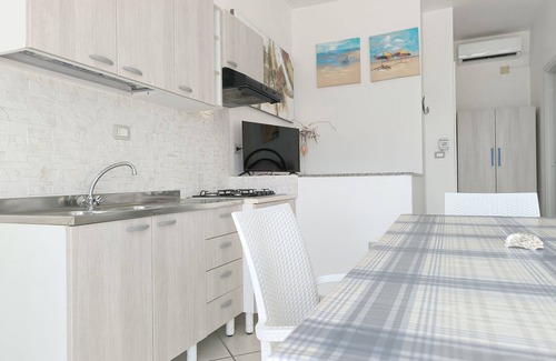 Posto Rosso House | MONOLOCALE LA CORTE SUL MARE