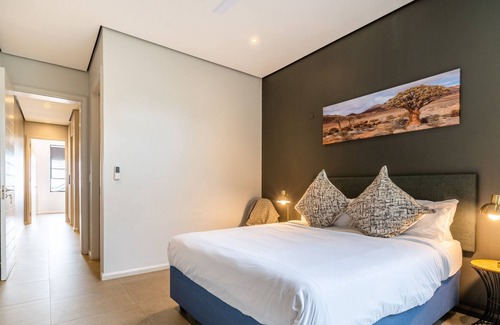 Salt Rock Apartment | Moody Modern Coastal Forest Condo
