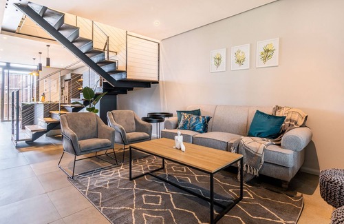 Salt Rock Apartment | Moody Modern Coastal Forest Condo