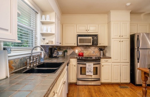 Mid America House | Moonlight Baydream: Lakefront Home w/Private Dock, Large Patio, Fast WiFi & Near Oaklawn & Downtown