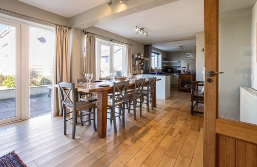Rhosneigr House | Morwennol : Spacious 5‑Bed Pet-Friendly Home 50m from Rhosneigr Beach | Managed by Anglesey Holiday