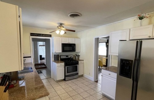 Sunrise Terrace House | Mother Road Manor Downstairs at the Fairgrounds