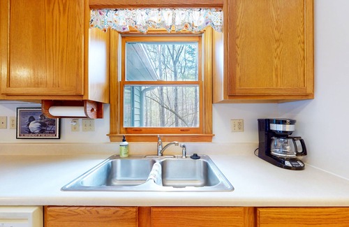 Winfield Cove Cabin | Mountainside abode with a wood stove, firepit, grill, sunroom, AC, and W/D