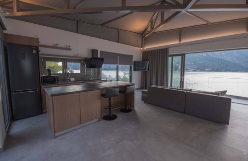 Evgiros Villa | Mr Grey luxury villa is a modern with its own private beach