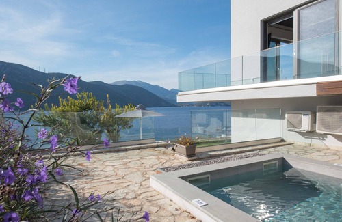 Evgiros Villa | Mr Grey luxury villa is a modern with its own private beach