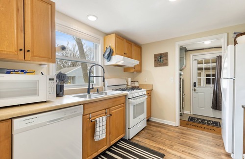 East Lansing House | MSU 2BR Home w/Garage, EV Charger, Patio & Grill – Walk to Campus