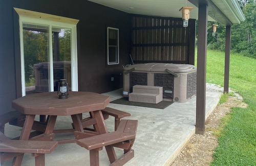 Logan Cabin | Multi-family cabin with two living spaces. Suitable for 8 guests.
