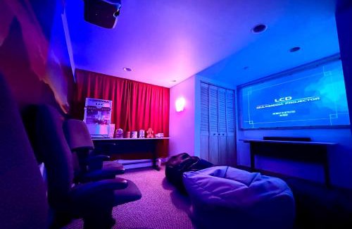 Blanchard House | Multi-Level Forest Lodge Near Silverwood with Vintage Ice Cream Parlor & Movie Theater