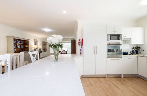 Corlette House | Muriel's Place A Stunning 3 bedroom 3-bathroom pet friendly home within 1klm walk to the beach