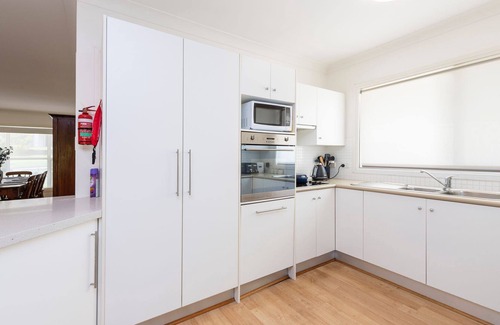 Corlette House | Muriel's Place A Stunning 3 bedroom 3-bathroom pet friendly home within 1klm walk to the beach