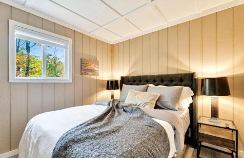 Huntsville Villa | Muskoka Waterfront Cottage with Canoes and Fire Pit
