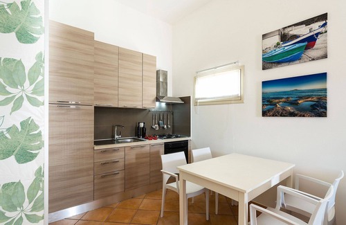 Reitani House | My Rental Homes - Apartment Kalimba with veranda, garden and the sun terrace.
