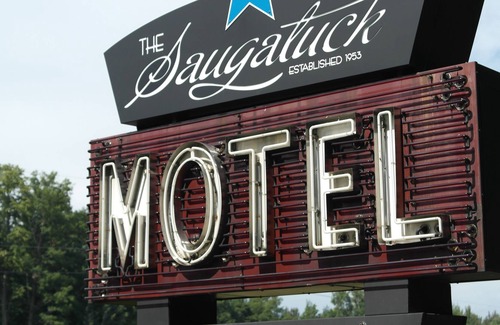 Saugatuck Resort | Named 1 of 17 Most Retro Motels in America epitomizing old school ambiance!