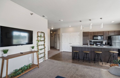 West Des Moines Apartment | Natural Light End Unit w/Private Balcony, Gym, Pool, Pickleball, Prime Location