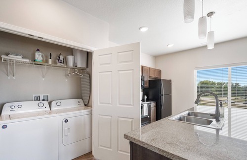 West Des Moines Apartment | Natural Light End Unit w/Private Balcony, Gym, Pool, Pickleball, Prime Location