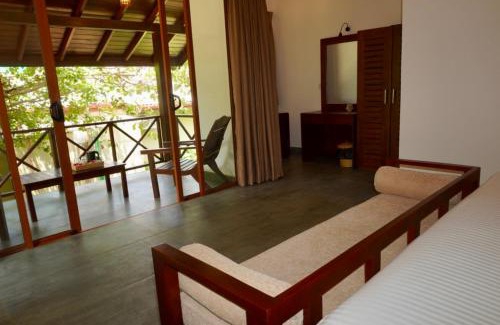 Dickwella Hotel | NatureSurf Villas - Private Garden Retreat at Hiriketiya Beach Yoga, Surf & Relaxation