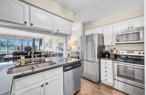 April Sound House | Near Festival! Pet Friendly 3BR Lakefront Condo with Patio Views, Swim Deck, & More!