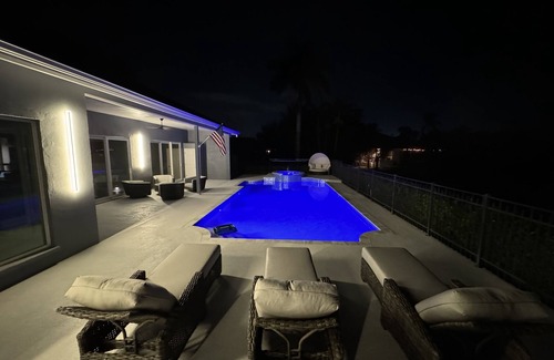 Palm River Estates House | Near NCH Baker, NSS Luxury Retreat Near Beach Featuring Pool GameRoom