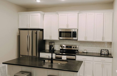 College Hill House | Nearby Wichita's Best! In Home W&D + Fenced Yard.