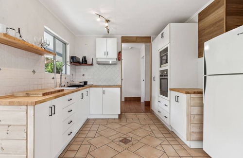 Red Rock House | Nestled in the heart of the serene seaside village of Red Rock.