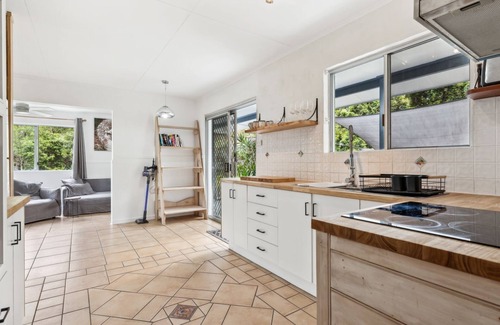 Red Rock House | Nestled in the heart of the serene seaside village of Red Rock.