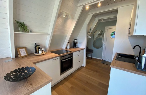 Carolinensiel House | Neu Nach Komplettrenovierung: Nurdachhaus Murmel 6 - Ladestation f. E-autos,wlan