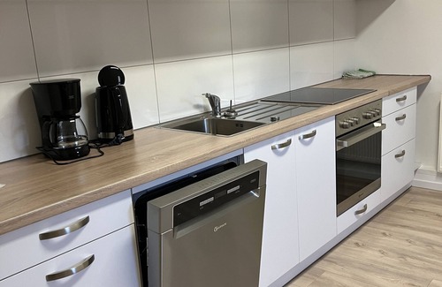 Weinheim Condo | New 2-room apartment also for fitters, fully furnished with kitchen