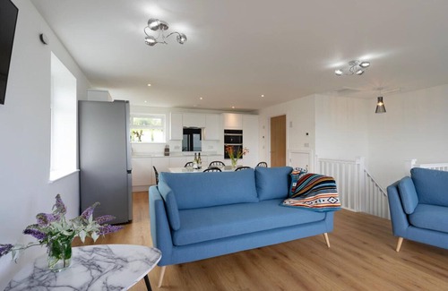 St Ives House | New 3 bedroom house, sleeps 6, St Ives with balcony, views, parking, wifi.
