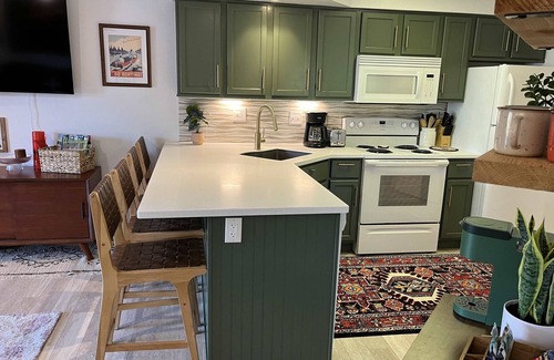 Wisconsin Dells Condo | NEW! Canoe Bay Riverwalk Retreat- Waterfront/Pool