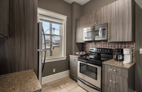 Central Business District Apartment | NEW Charming 2nd Floor Victorian Flat in Downtown Kalamazoo