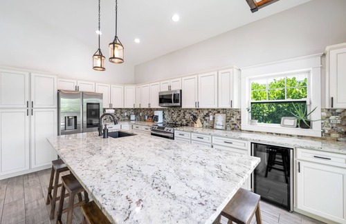Jensen Beach House | New Construction Lakefront Home with Mini Golf Course, Heated Saltwater Pool!
