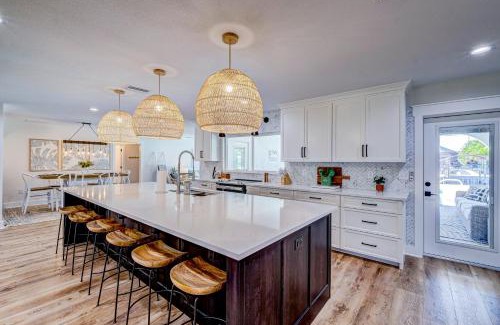 Whitney Beach House | NEW! Cortez Cabana! Canal front home with heated pool & boat dock!