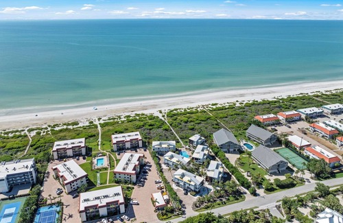 Sanibel House | New Cyprina Unit #2 – a fully renovated, Serena & Lily–inspired townhome on Sanibel’s sought-after East End. This luxury beach retreat seamlessly blends coastal elegance with modern comfort, offering breathtaking direct water views from every room.