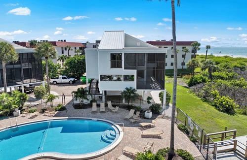 Sanibel House | New Cyprina Unit #2 – a fully renovated, Serena & Lily–inspired townhome on Sanibel’s sought-after East End. This luxury beach retreat seamlessly blends coastal elegance with modern comfort, offering breathtaking direct water views from every room.