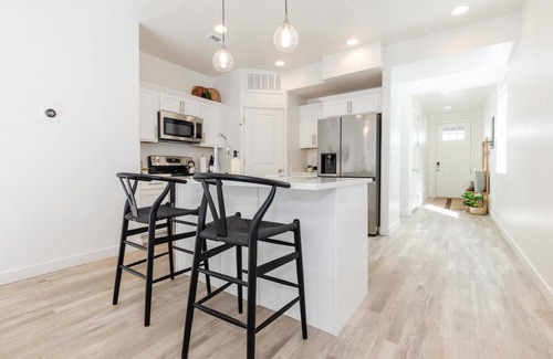 Garden City Villa | New Designer Townhome w Trailer Parking Games